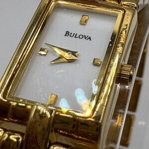 Bulova Ladies Tank Watch 97T57 - Minimalist White Dial - Gold Tone